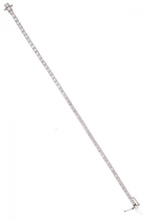 Appraisal: A DIAMOND LINE BRACELET mounted in white gold