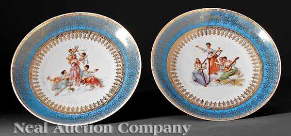 Appraisal: A Pair of French Transfer and Hand-Decorated Chargers c signed