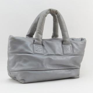 Appraisal: Chanel Metallic Silver-Tone Coco Cocoon Reversible Tote Silver-tone hardware dual