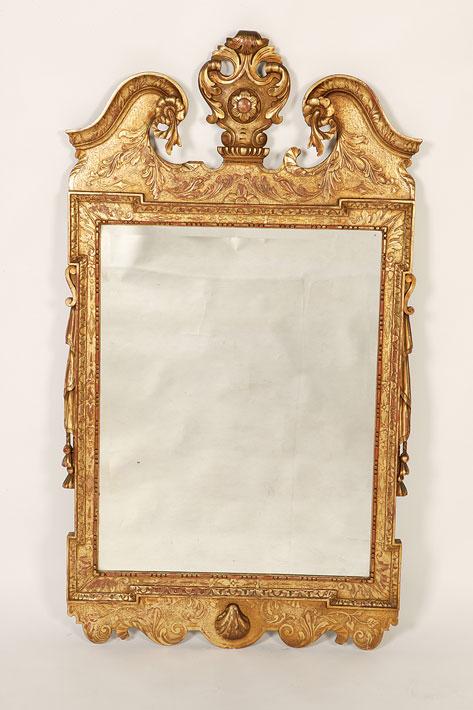 Appraisal: A GEORGE II STYLE GILT FRAMED WALL MIRROR the rectangular