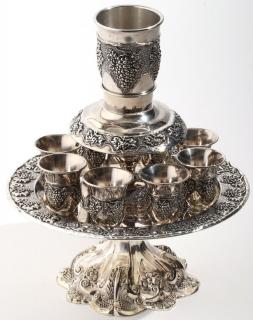 Appraisal: With central wine cup and eight smaller cups on a