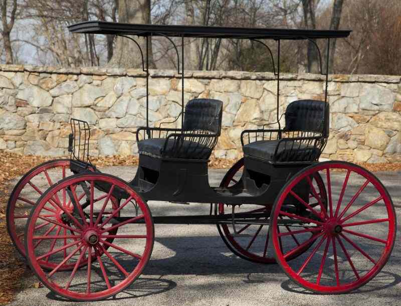 Appraisal: American Horse Drawn Surreycirca two double seats under canopy black