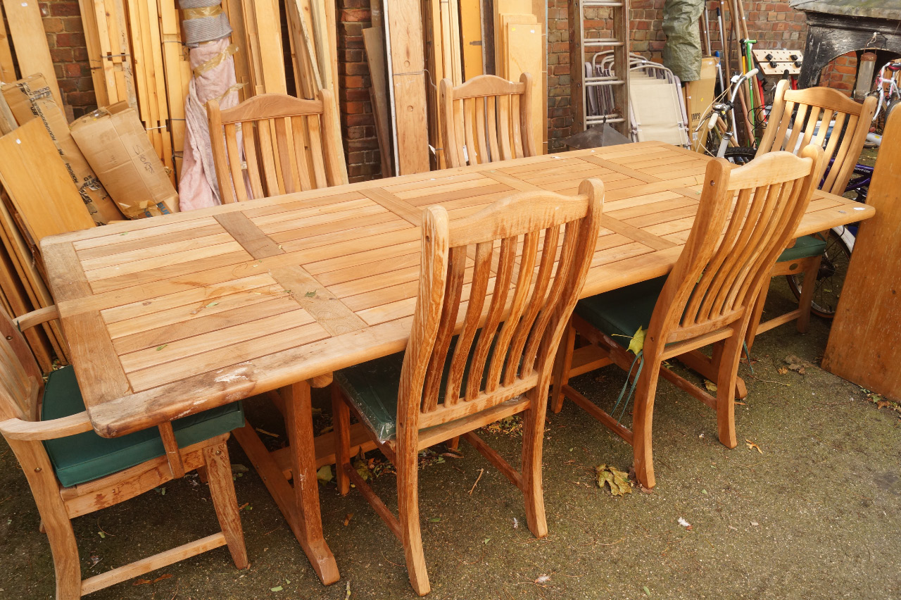 Appraisal: A modern teak slat top patio table of large proportion