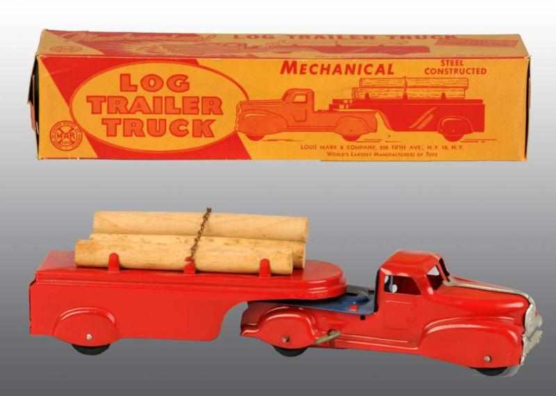 Appraisal: Pressed Steel Marx Wind-Up Log Trailer Truck Toy Description Includes