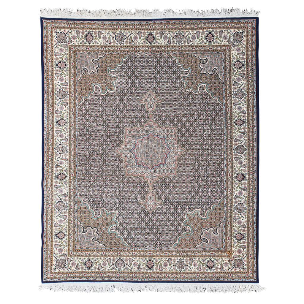 Appraisal: TABRIZ CARPET NORTHWEST PERSIA MODERN the indigo field with cream