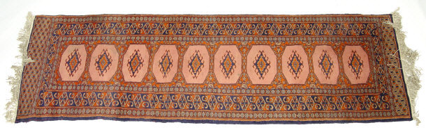 Appraisal: Rectangular Eastern style carpet runner decorated with a blue and