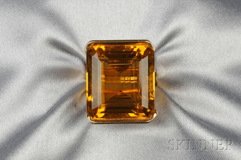 Appraisal: kt Gold and Citrine Ring set with an emerald-cut citrine