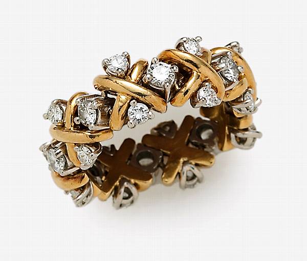 Appraisal: A diamond platinum and eighteen karat gold flexible ring Tiffany