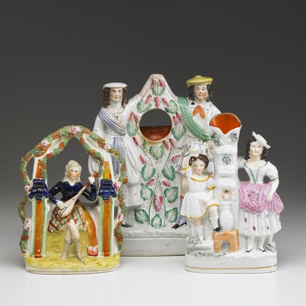 Appraisal: STAFFORDSHIRE Three figurines includes watch hutch lute player and a