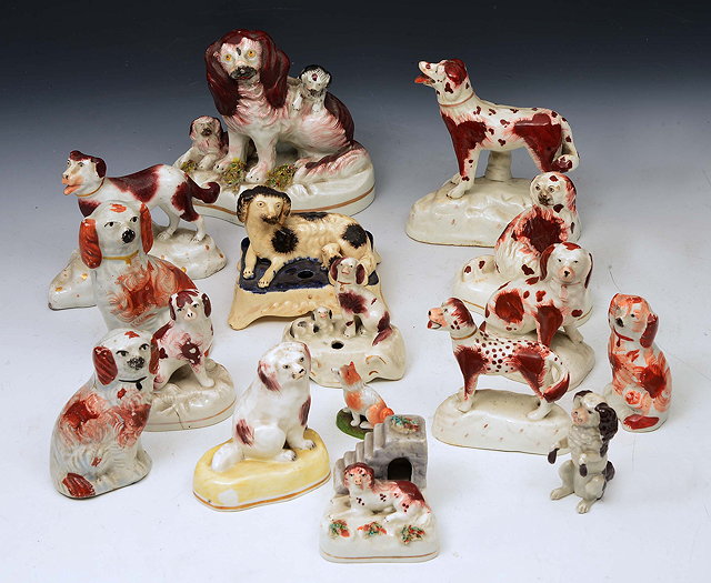 Appraisal: A COLLECTION OF SIXTEEN CERAMIC MODELS of spaniels principally Staffordshire