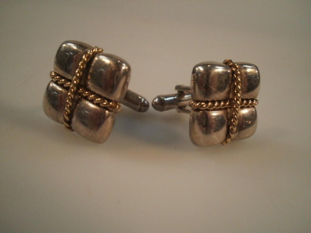 Appraisal: A pair of 'parcel' cuff links applied patch 'TIFFANY '