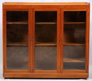 Appraisal: OAK BOOKCASE THREE DOORS OAK BOOKCASE THREE DOORS H L