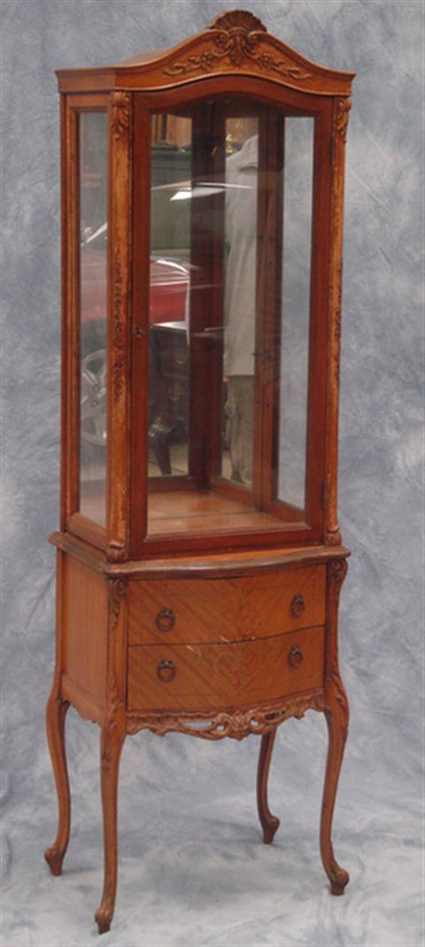 Appraisal: Louis XV style walnut vitrine cabinet circa shell carved arch