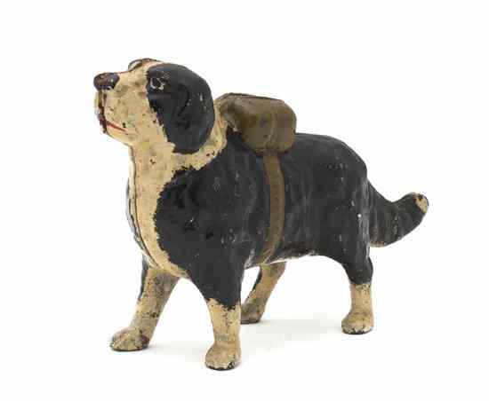 Appraisal: An American Cast Iron Painted Dog depicting a dog carrying