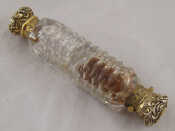 Appraisal: A double ended silver gilt mounted cut glass perfume bottle