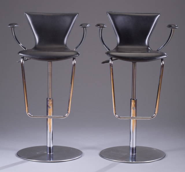 Appraisal: Two Chrome and Leather 's Bar Chairs Swivel base H