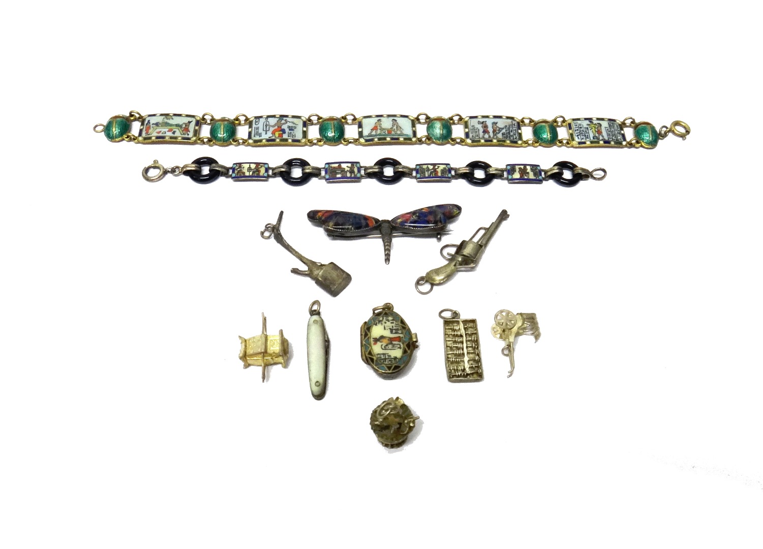 Appraisal: Two enamelled bracelets decorated with ancient Egyptian inspired motifs an