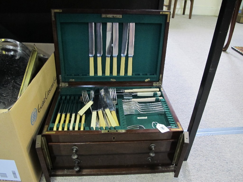 Appraisal: A part set of cutlery in mahogany canteen