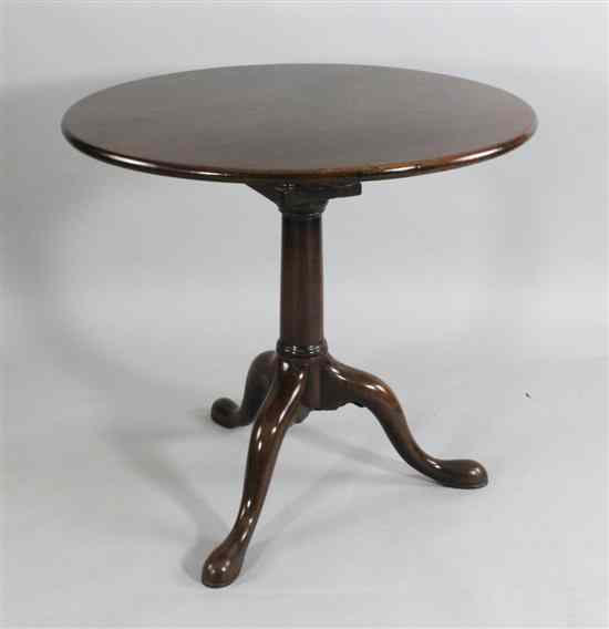 Appraisal: A George III mahogany circular occasional table with solid top