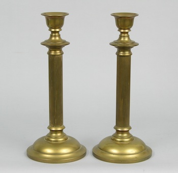 Appraisal: A Pair of English Brass Candleholders A pair of English