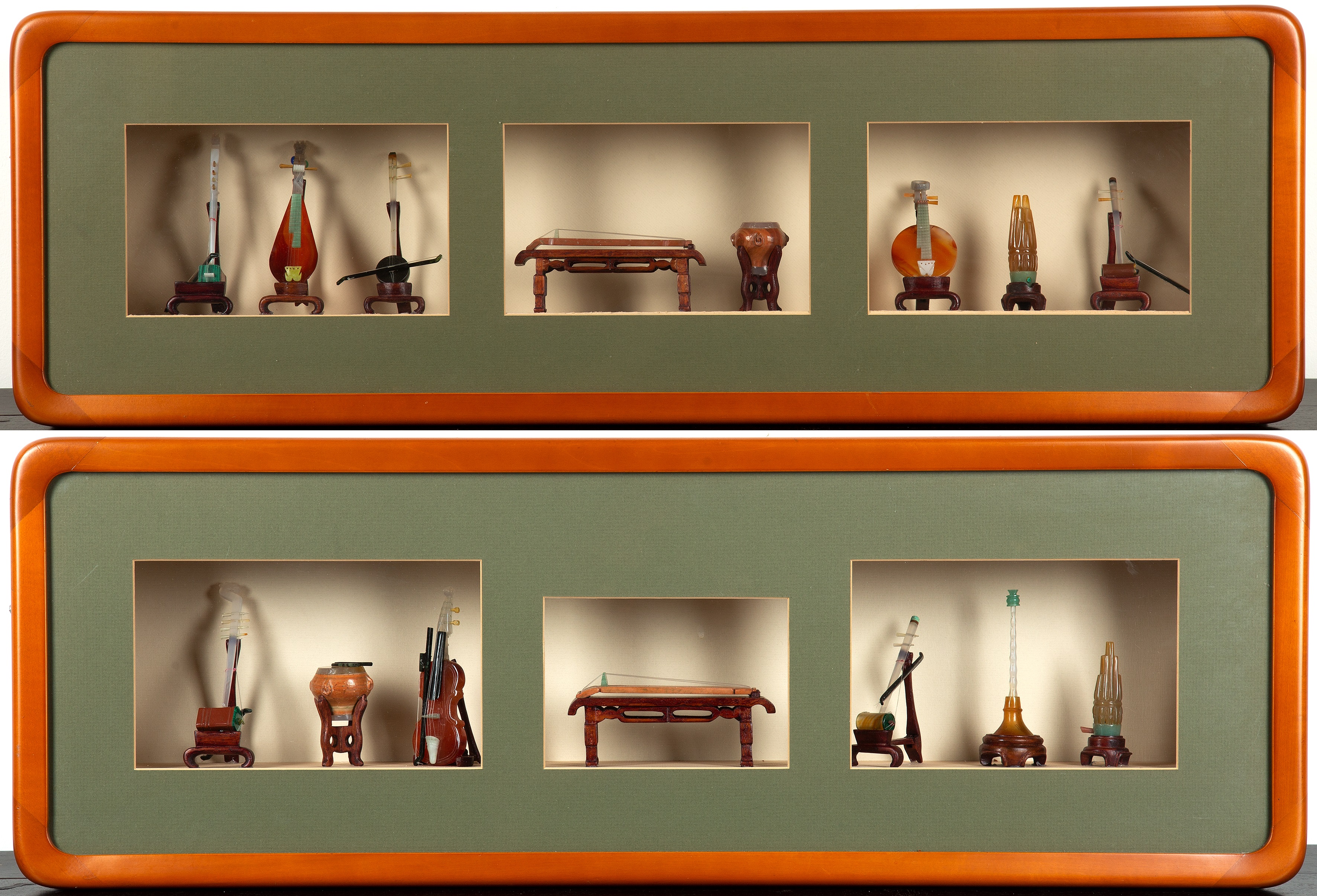 Appraisal: Pair of framed cases containing miniature traditional musical instrumentsChinese th