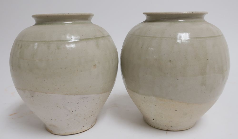 Appraisal: Pair Tang Style Jars with Celadon Glaze Very fine matching