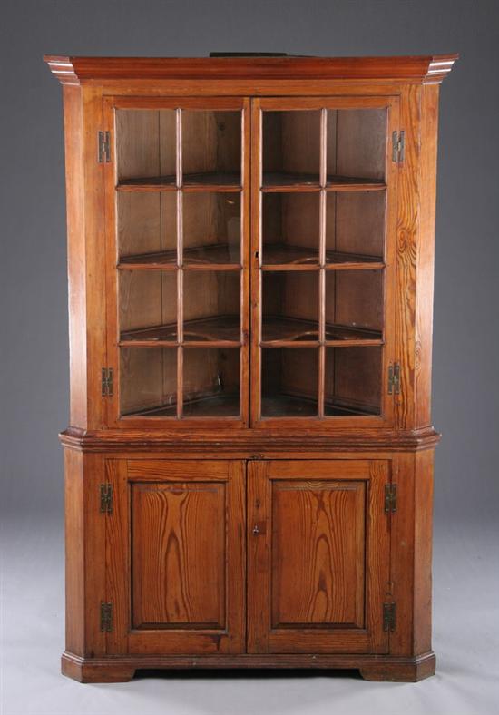 Appraisal: AMERICAN SOUTHERN YELLOW PINE CORNER CUPBOARD th century attributed to