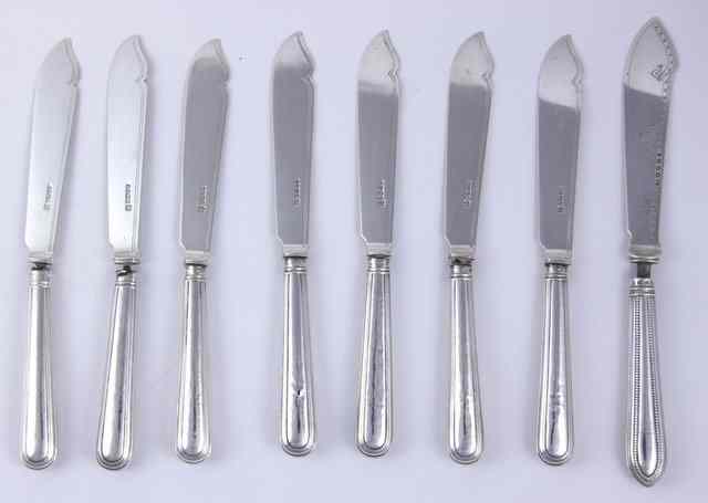 Appraisal: Eight silver fish knives Richard Martin and Ebenezer Hall Sheffield