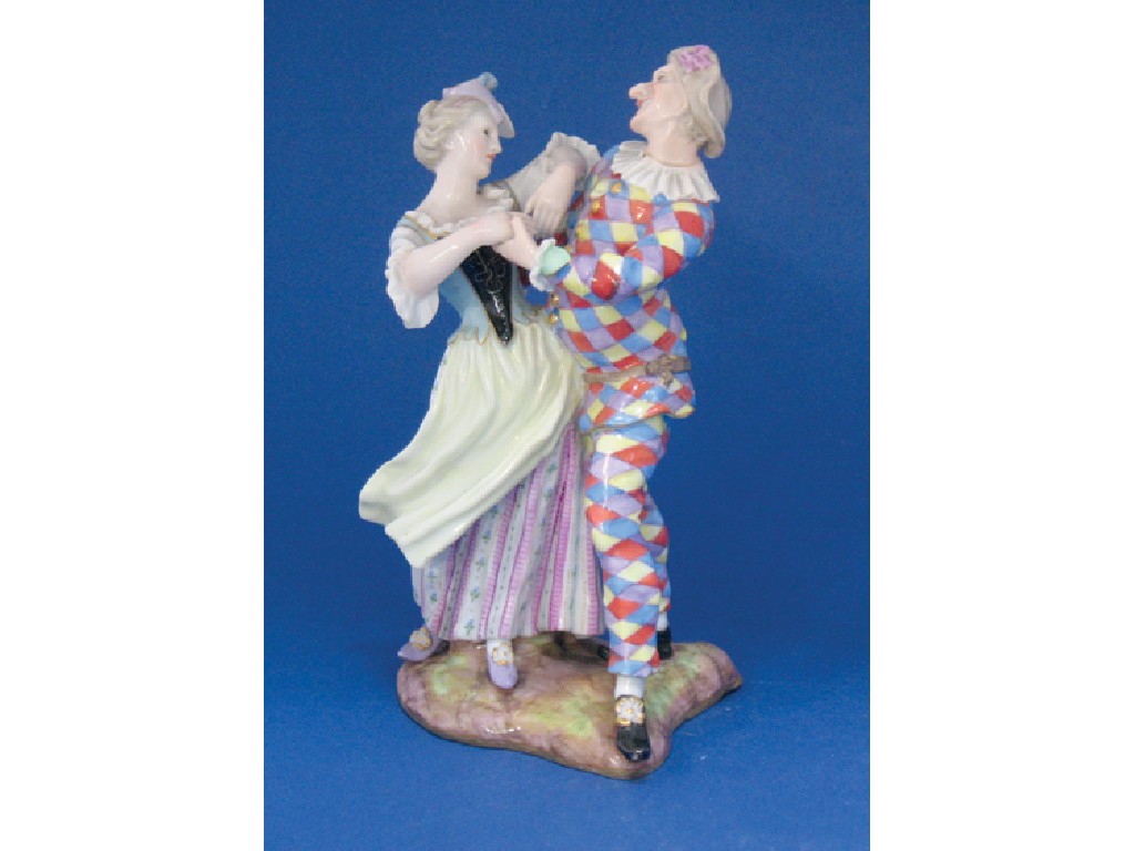 Appraisal: A MEISSEN FIGURE OF A HARLEQUIN dancing with a woman