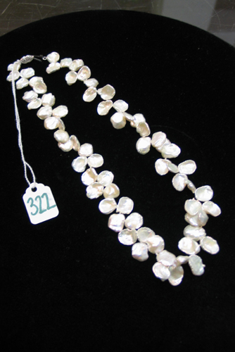 Appraisal: A LINDA BERGMAN KESHI POPPY SEED PEARL NECKLACE repeating white