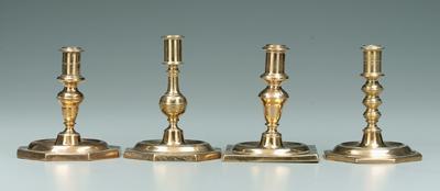 Appraisal: Four brass candlesticks three with octagonal bases one with square