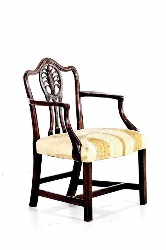 Appraisal: George III carved mahogany armchair circa shaped and carved crestrail