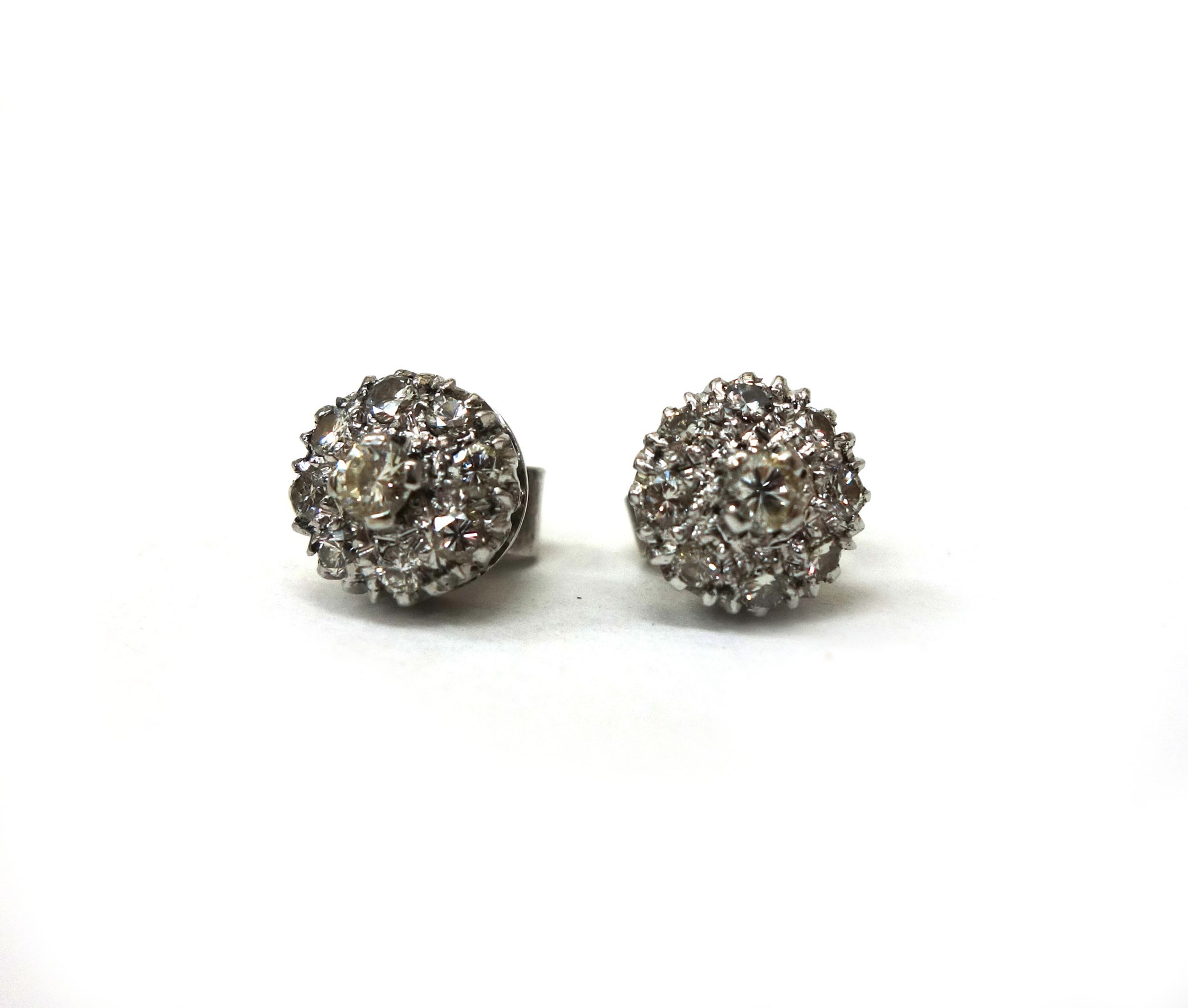 Appraisal: A pair of diamond cluster stud earrings each set with