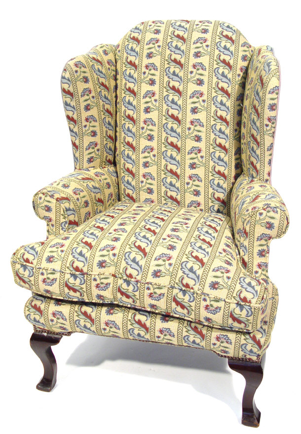 Appraisal: Mahogany framed wingback armchair with scroll shaped arms on cabriole