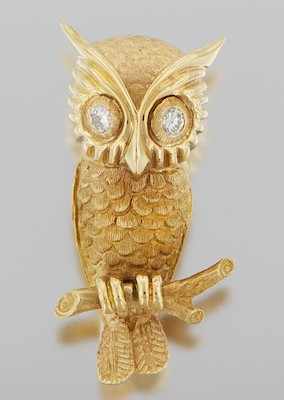 Appraisal: A Gold and Diamond Owl Brooch k yellow gold brooch