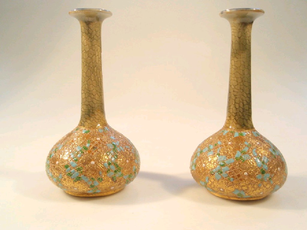 Appraisal: A pair of Royal Doulton slaters patent stoneware bottle vases