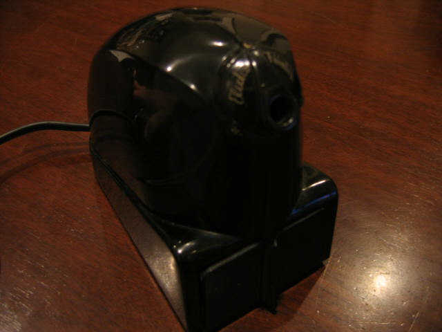 Appraisal: ELECTRO POINTER electric pencil sharpener with black Bakelite housing manufactured