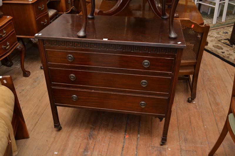 Appraisal: A GEORGIAN STYLE THREE DRAWER CHEST ON CASTERS A GEORGIAN