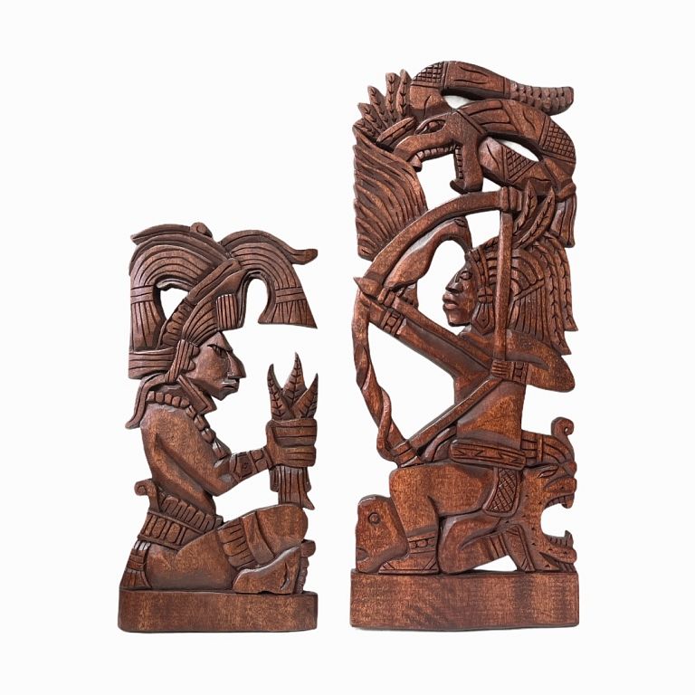 Appraisal: Mexican Carved Wood Wall Panels Detailed carved wood representing warriors