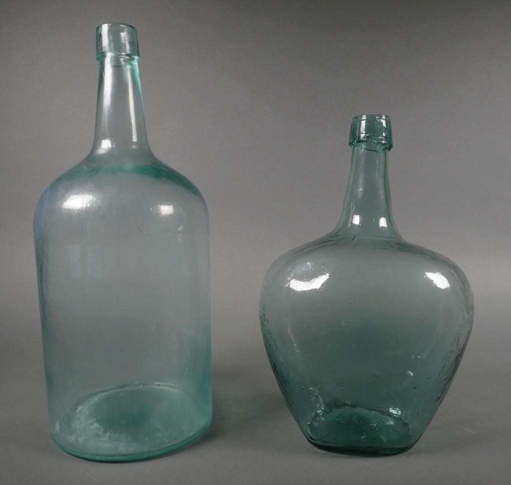 Appraisal: Two c demi-john or carboy antique blown glass bottles Tallest