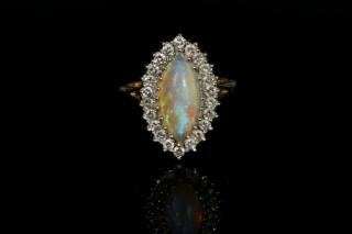 Appraisal: LADY'S RING K Yellow Gold Crystal Opal and Diamond Ring