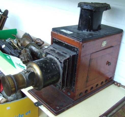 Appraisal: A Victorian mahogany carved magic lantern by E G WOOD