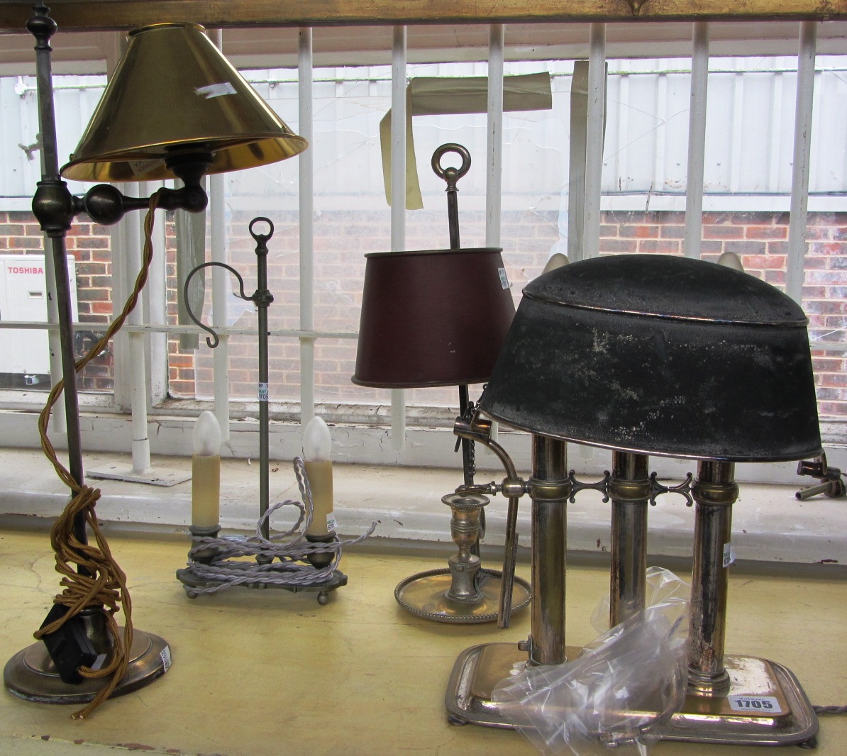 Appraisal: A three light lampe bouillotte and three similar lamps