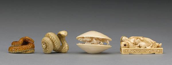 Appraisal: A group of two ivory studies Each of a coiled