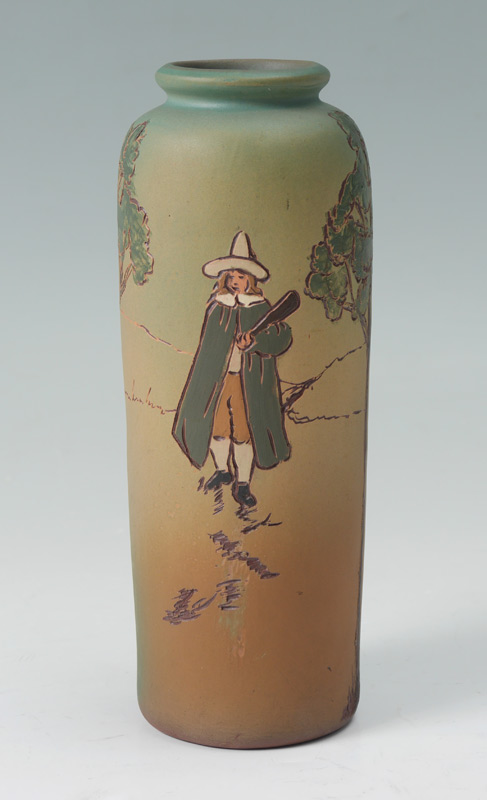 Appraisal: WELLER DICKENSWARE CYLINDER VASE Incised decoration of hunter with blunderbuss