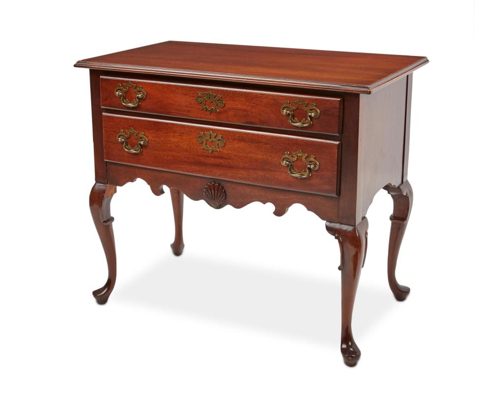 Appraisal: An English Queen Anne-style two-drawer dresser Second-half th Century With