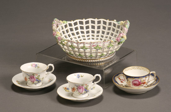 Appraisal: German Reticulated Porcelain Centerbowl and Three Cups and Saucers Late