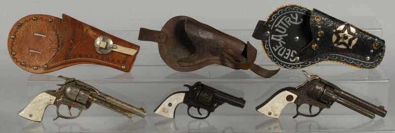 Appraisal: Lot of Cap Guns in Holsters Description Includes one Gene