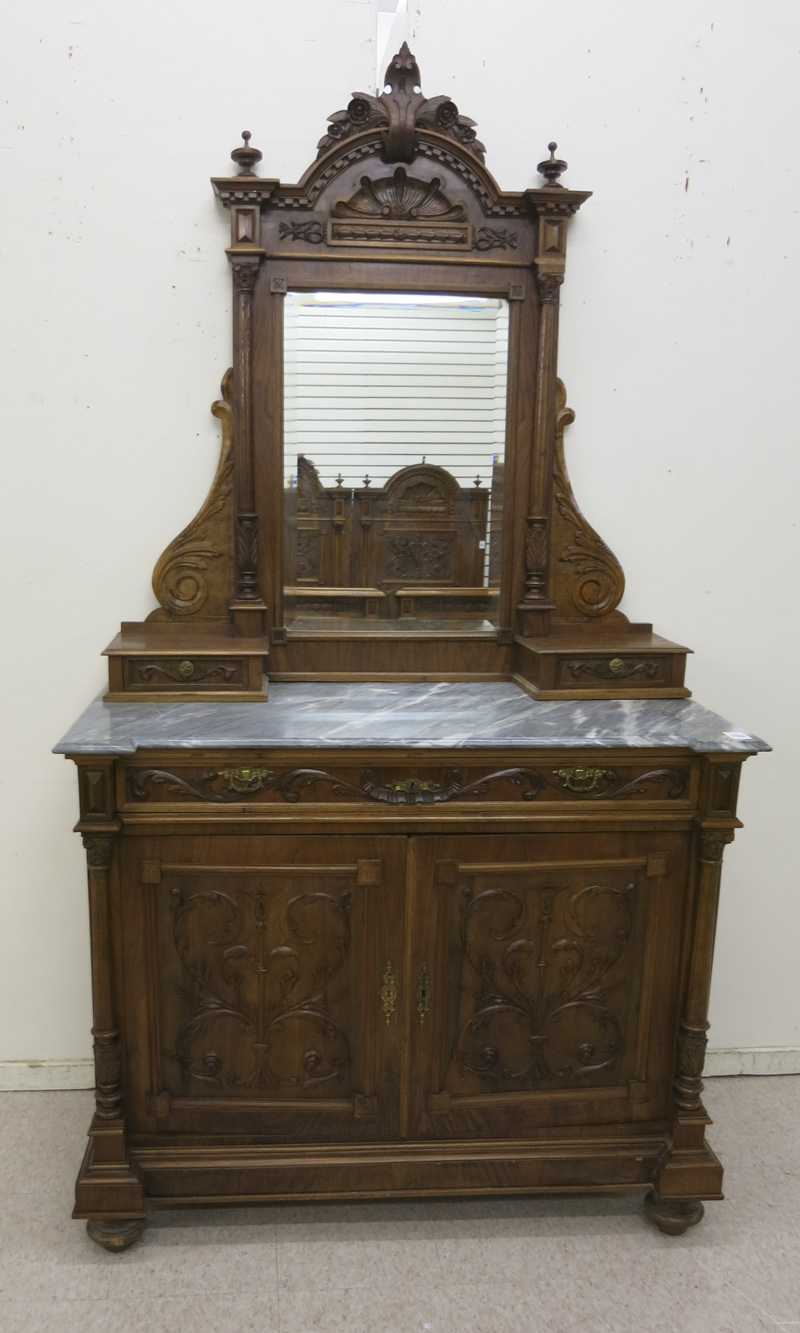 Appraisal: MARBLE-TOP WALNUT DRESSER Austrian th century a -door cabinet dresser