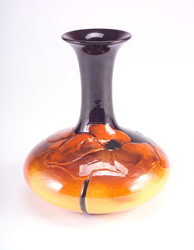 Appraisal: ROOKWOOD Fine and rare Carved Standard glaze bottle-shaped vase decorated